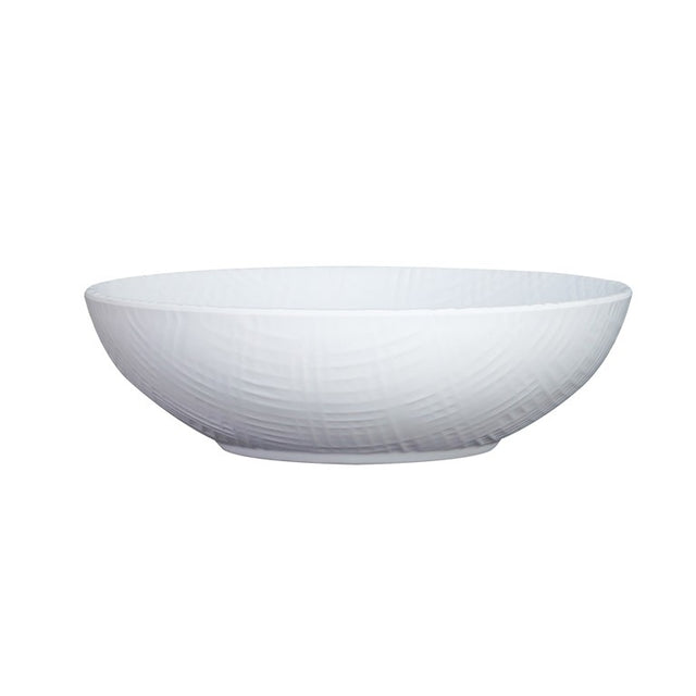 A white serving bowl with a subtle textured pattern on its exterior. This shallow ceramic bowl features a slightly flared rim and small, flat base, and is placed on a plain white background.