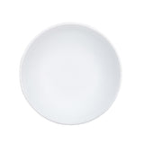 A plain, round, white ceramic plate is shown from above on a white background. The plate has a smooth surface with subtle crosshatch patterns and a slightly raised rim, echoing the minimal style of a white serving bowl.