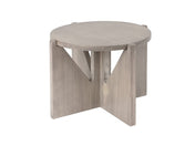 A round, gray-washed pine wood side table with a smooth top and intersecting, flat panel legs forming an X-shape underneath. The knockdown design and minimalist look evoke the modern elegance of the Aspen Riser collection.
