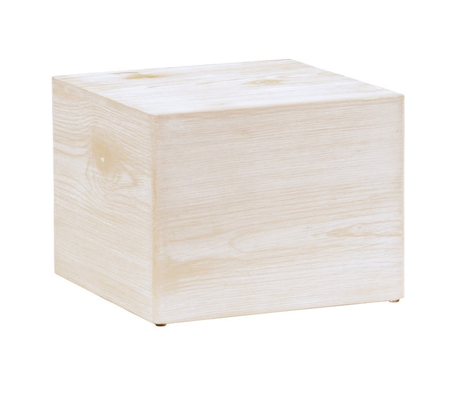 A light-colored white-washed pine wood cube sits on a white background. With smooth, natural grain and slightly rounded edges, this Newport-inspired riser brings a minimalist and modern touch to any setting.