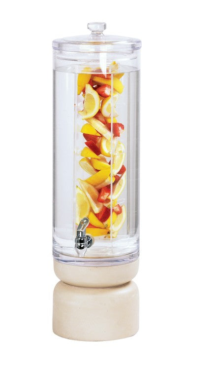 A clear 3 gallon beverage dispenser sits on a round, light-colored base, its central infuser tube stacked with slices of lemon, orange, and red apple for a refreshing fruit infusion. A silver spigot completes the elegant look.