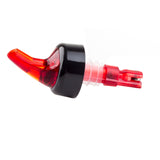 A red plastic TableCraft Products liquor bottle pourer with a black collar and clear base, designed for precise, drip-free pouring. This 1 oz. pourer features an angled spout for proper pour control against a plain white background.