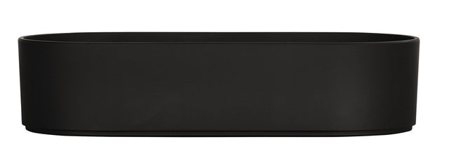 A matte black, oval-shaped Hudson Bowl with smooth sides and a flat base, photographed against a white background. This minimalist tray appears to be dishwasher safe and is empty, with no visible handles or decorative features.