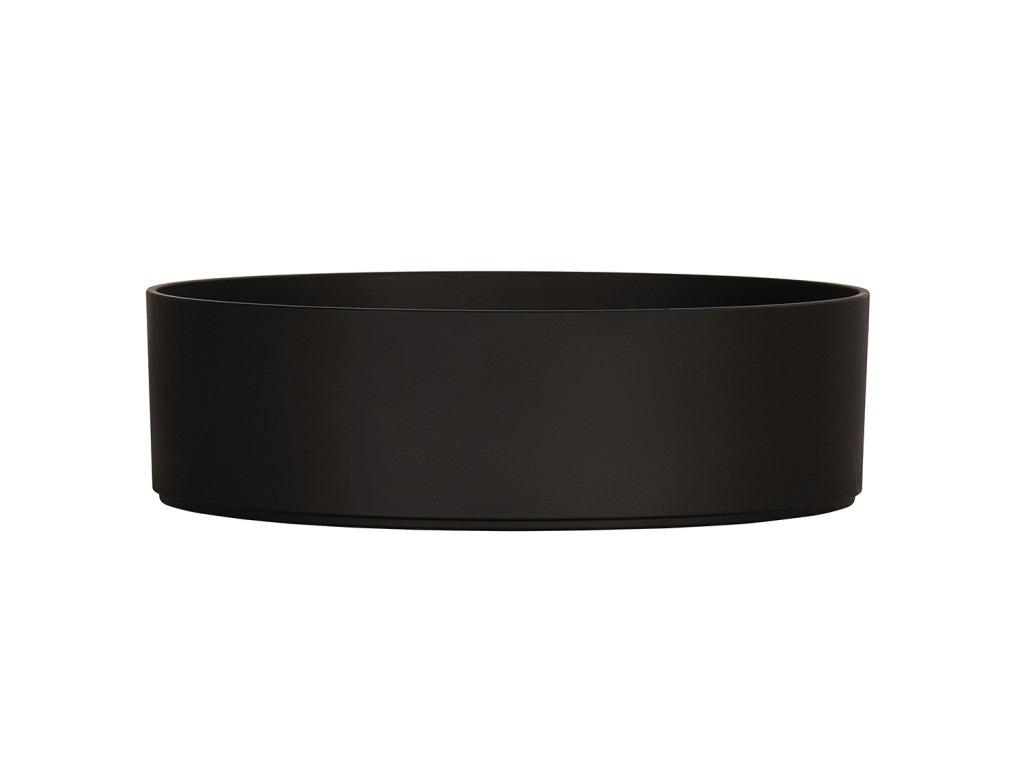 The matte black Hudson Bowl is a round, shallow dish with straight sides and a smooth surface, shown against a white background. This modern, minimalist melamine bowl is dishwasher safe and perfect for contemporary dining.