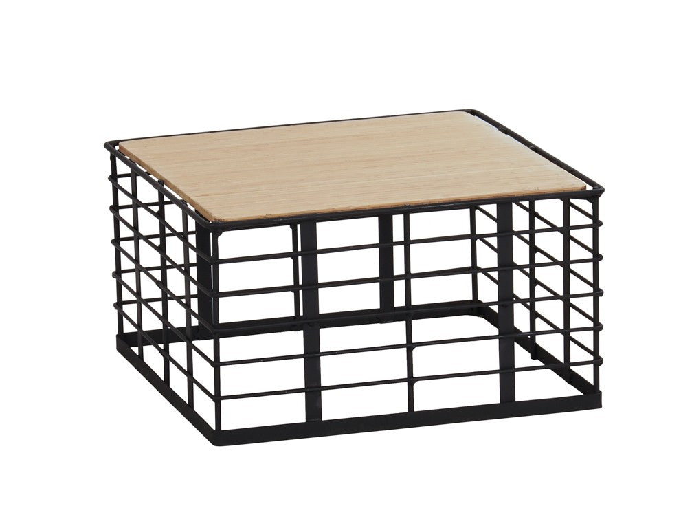 A small, square Madison riser with black metal grid sides and base, topped with a flat, light wood panel. Its minimalist, industrial-style container features a reversible design for versatile storage or display options.