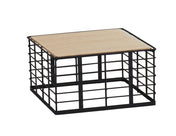 A small, square Madison riser with black metal grid sides and base, topped with a flat, light wood panel. Its minimalist, industrial-style container features a reversible design for versatile storage or display options.