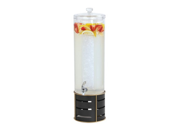 A tall, clear Cal-Mil beverage dispenser with a spigot sits on a black and gold stand. Featuring an ice chamber down the center, it’s filled with water, ice, lemon slices, and strawberries. The transparent lid completes its elegant look.