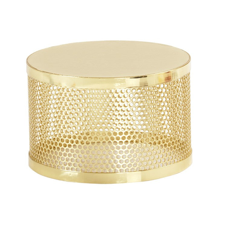 A round, shiny gold metal riser with a solid top and bottom. The sides feature a mesh design of evenly spaced circular holes for an open, airy appearance. Its smooth, reflective surface stands out against a white background, evoking Monaco elegance.