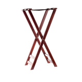 A wooden folding luggage rack with a mahogany finish, X-shaped frame, and two black straps on top for holding suitcases. The rack features rubber slip-proof feet and stands upright on a white background.