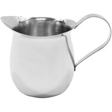 A shiny, 5 oz stainless steel bell creamer with a curved handle and wide spout, designed for pouring cream or milk. The small metal pitcher features smooth, rounded sides and a reflective finish, set against a plain white background.