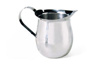 A shiny stainless steel Bell Creamer pitcher with a curved handle and wide spout sits on a white background. The pitcher has a rounded body, a reflective surface, and is dishwasher safe, with no visible markings or decorations.