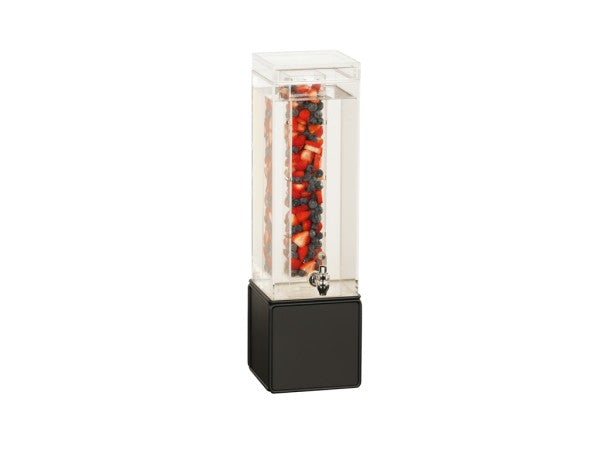 A tall, rectangular clear beverage dispenser with a black metal base features an infusion chamber filled with water and visible pieces of red, black, and white fruit. The spigot near the bottom allows easy pouring against a plain white background.