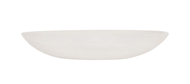 A shallow, oval-shaped white ceramic bowl is pictured in side profile against a plain white background. The bowl has smooth, gently curved sides and a glossy finish, resembling the elegance of a white marble bowl with no visible patterns or decorations.