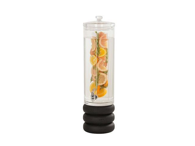 A 3-gallon drink dispenser with a transparent lid, filled with water, citrus slices, and herbs. This infusion beverage dispenser stands on three stacked black discs and features a small spigot near the bottom for easy serving.