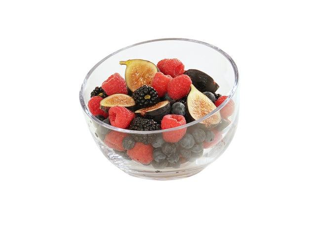 A 6 inch Cal-Mil 23809-6-12 polycarbonate bowl filled with fresh berries and fruit—raspberries, blueberries, blackberries, and sliced figs—all beautifully arranged against a plain white background.