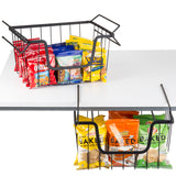 A black powder coated metal basket hangs from a white shelf’s edge, holding assorted snack bags like Cheez-It, Lay’s Baked, and Sun Chips, organized upright in two rows for easy access—a stackable hanging basket solution.