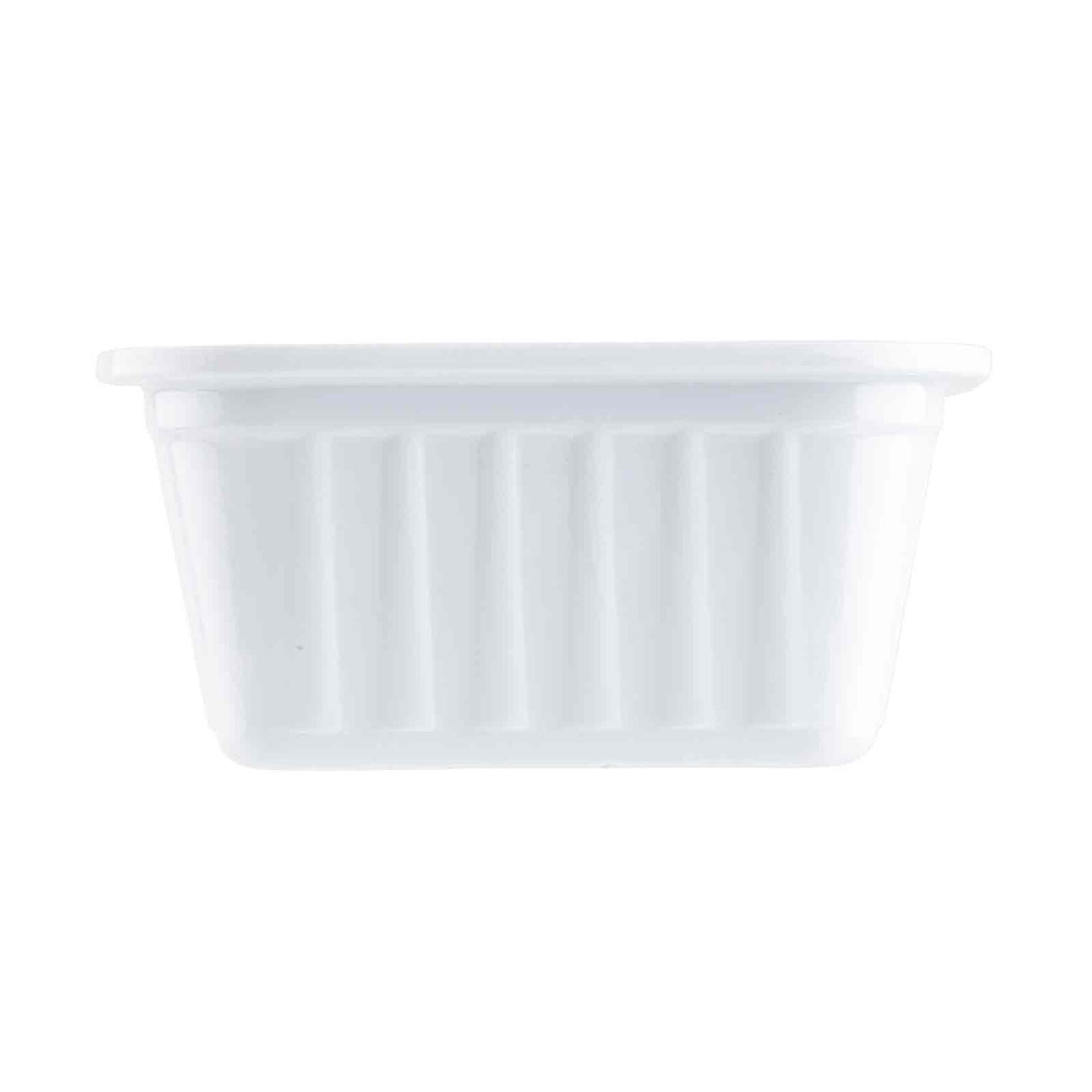 A plain, small, white melamine sauce cup is viewed from the side. The container has vertical ridges along the sides and a slightly flared rim at the top. The background is completely white, making the container clearly visible.