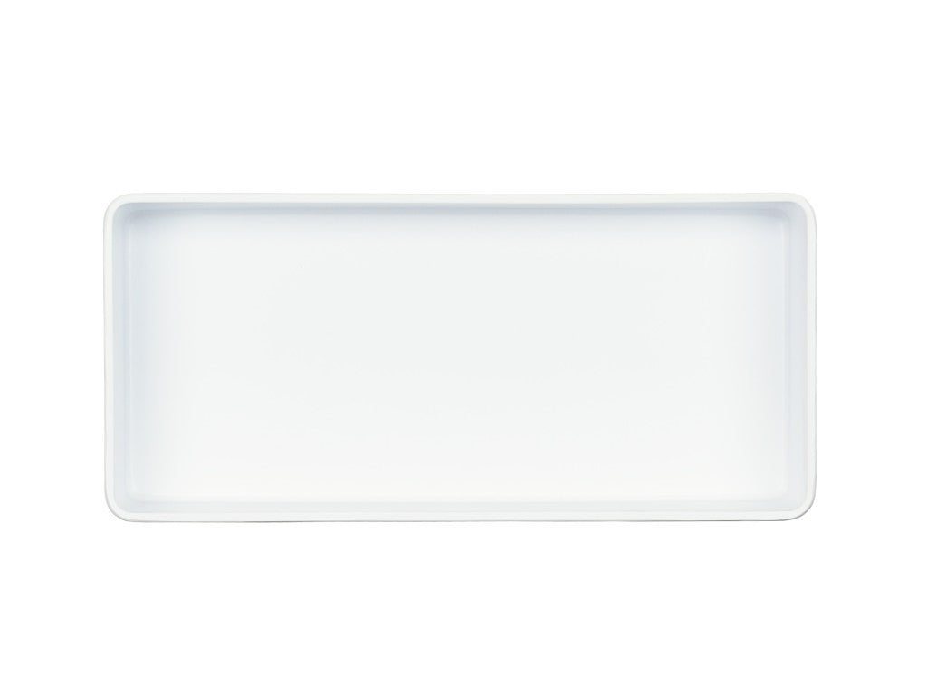 A rectangular, white, shallow tray with rounded corners is centered on a plain white background. Made from dishwasher safe melamine, the tray features smooth edges and a minimalist design. The image is well-lit and taken from a top-down perspective.