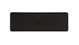 A rectangular, black plastic tray with slightly raised edges is shown from above. The smooth surface features a subtle embossed symbol in the center. Dishwasher safe, the tray’s shape and design stand out against the white background.