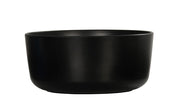 A plain, matte black Oslo Bowl with smooth rounded sides and a slightly flared rim, shown against a white background. This melamine bowl is empty and features a simple, modern design that is also dishwasher safe.