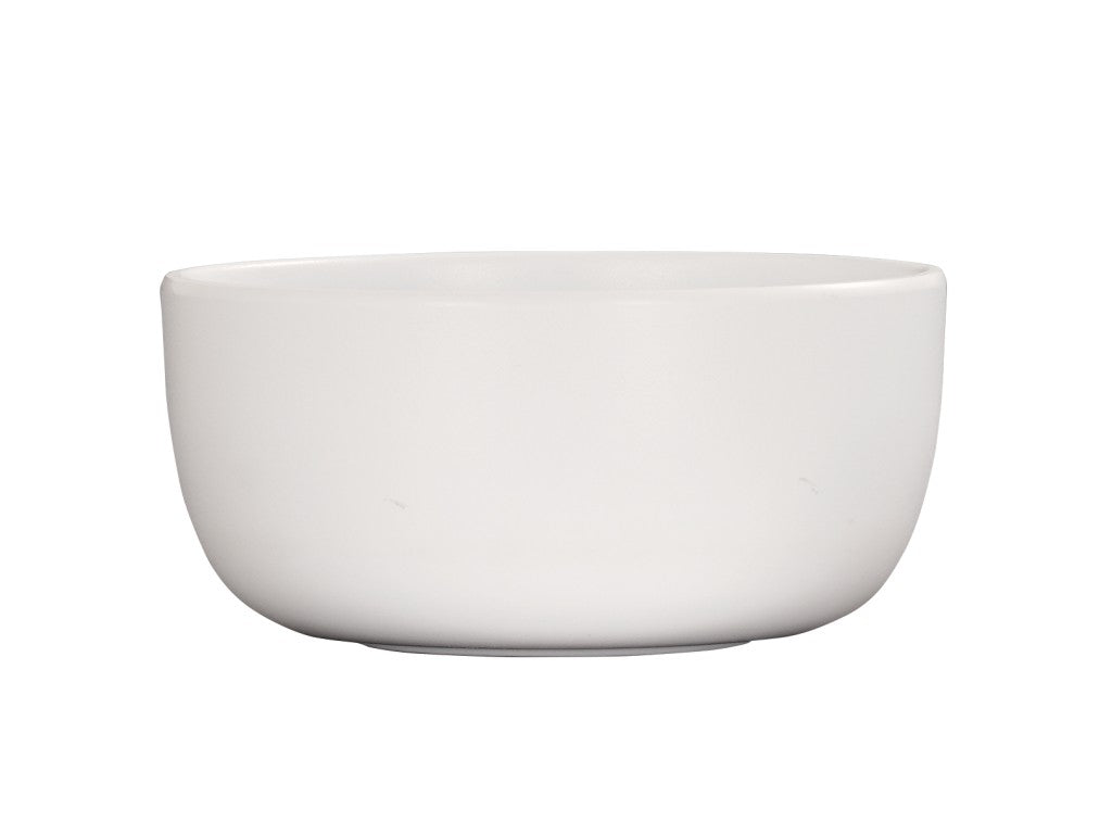 A plain, round, white Oslo bowl is shown against a white background. The bowl has smooth sides, a slightly curved rim, and no visible patterns or decorations. Dishwasher safe, it appears empty and is viewed from a slight side angle.