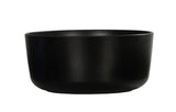 A matte black, round ceramic Oslo Bowl with smooth sides and a slightly curved rim, placed against a plain white background. Dishwasher safe, the bowl is empty and showcases a minimalist, modern design.