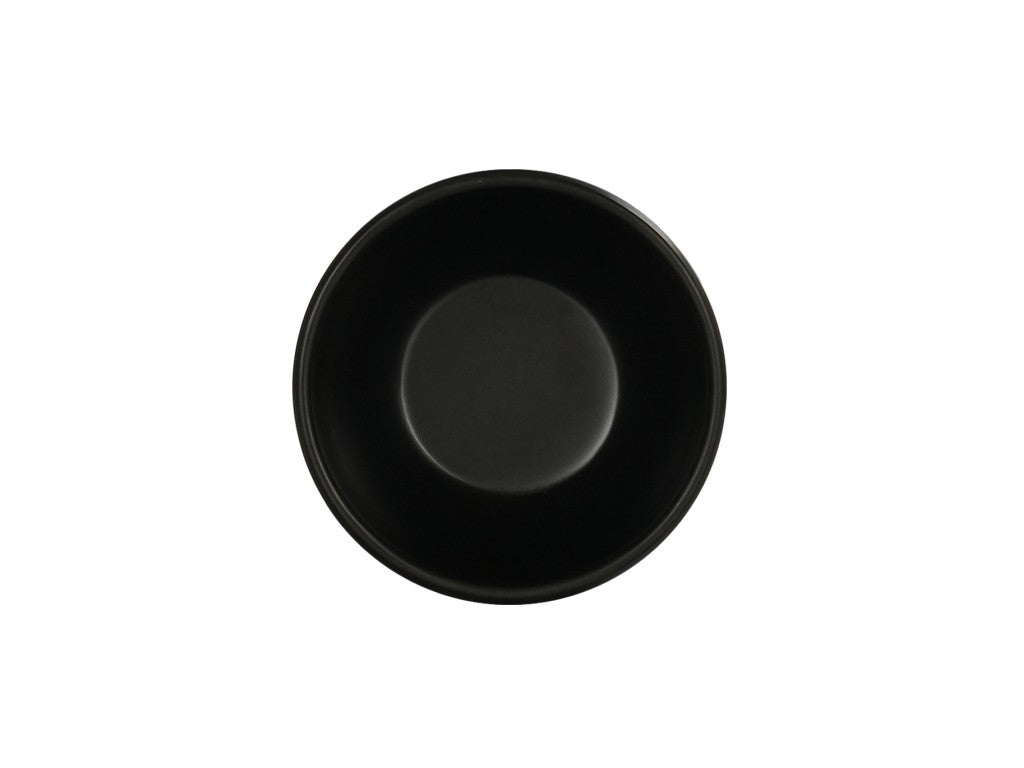 A plain, round, black Oslo Bowl viewed from above, centered against a white background. The melamine bowl is empty and has smooth, clean edges with a matte finish and is dishwasher safe.