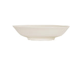 A plain, white, shallow Hand Thrown Bowl with a slightly irregular, organic-shaped rim. Photographed from the side against a white background, it highlights the bowl’s minimalistic and modern design. Dishwasher safe for easy cleaning.