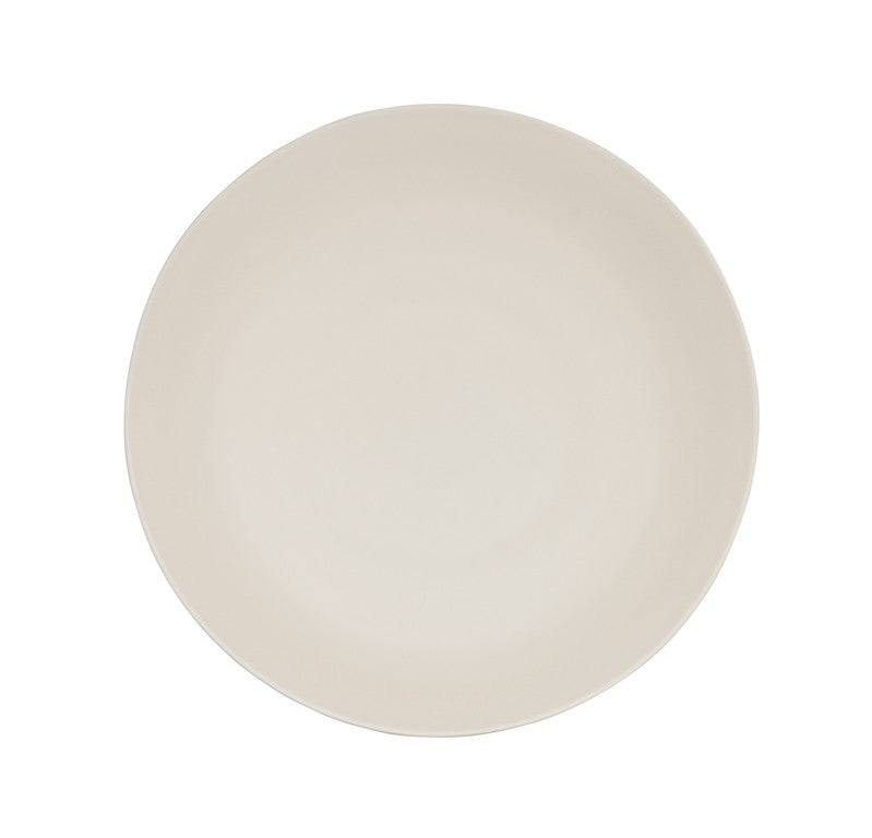 A plain, round, off-white ceramic plate is shown from above on a white background. Its smooth surface and slightly uneven edges give it a simple, minimalist look reminiscent of a Hand Thrown Bowl, and it is conveniently dishwasher safe.