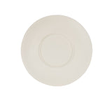 A plain, round, off-white ceramic plate viewed from above, featuring a slightly raised rim and a subtle indented circle near the center. Reminiscent of a hand thrown bowl, it sits against a completely white background.
