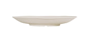 A white, shallow, oval-shaped ceramic plate with slightly wavy edges is shown in profile against a plain white background. Dishwasher safe, it features a smooth surface and sits on a small, rounded base for added elegance.