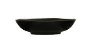 A shallow, round hand thrown bowl with slightly curved sides and a matte finish, viewed from the side against a plain white background. The bowl features smooth, clean lines and a small, raised base.