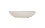 A plain, white, hand thrown bowl with smooth, gently curved sides and a slightly uneven rim sits on a white background. The minimalist, unadorned design gives this ceramic vessel a simple and modern appearance.