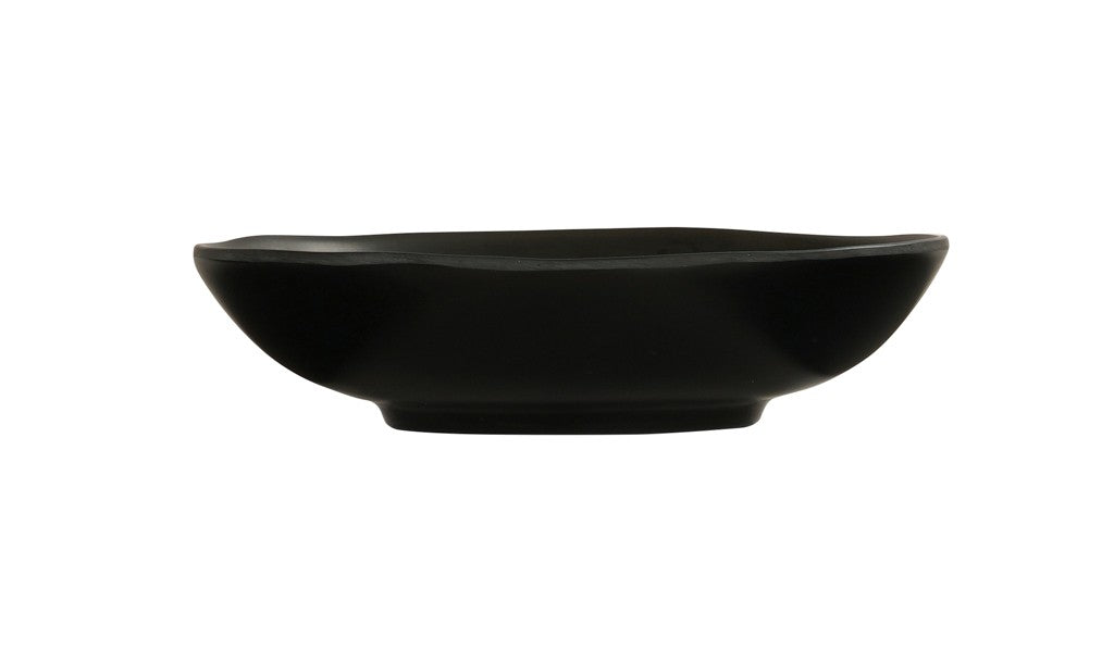 A plain, black, shallow ceramic bowl with slightly flared sides and a smooth matte finish, shown in a side profile view against a white background. This hand thrown bowl is both stylish and functional.