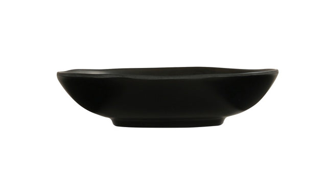 A plain, black, shallow ceramic bowl with slightly flared sides and a smooth matte finish, shown in a side profile view against a white background. This hand thrown bowl is both stylish and functional.