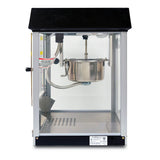 A countertop popcorn machine with a transparent glass body, black top, and stainless steel kettle in the center. The door is closed with no popcorn inside. Control labels and wiring are visible on the left side of this popcorn popper.