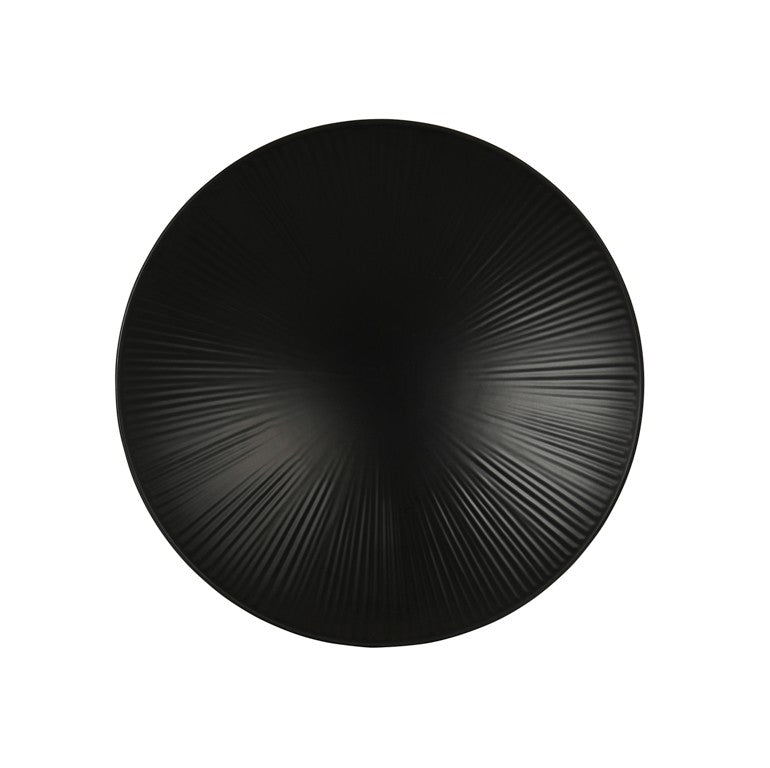 A round, matte black melamine plate viewed from above, featuring a subtle radial pattern of ridges radiating to the edges for a sunburst effect. This dishwasher safe design pops against the plain white background.