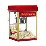 A red vintage-style Fun Pop Red Popper popcorn machine with gold trim features an 8 oz kettle, filled with freshly popped popcorn. Two striped boxes labeled Pop Corn sit inside its clear glass case, with Popcorn written in yellow on the front.