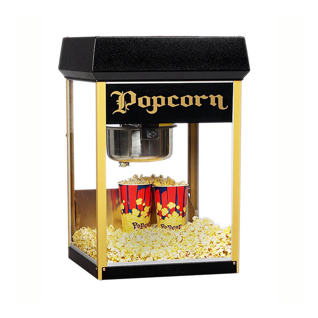 A vintage-style popcorn machine with a black and gold frame sits on a white background. Featuring an 8 oz kettle, this countertop popper displays "Popcorn" in ornate gold letters, with two red and yellow tubs surrounded by freshly popped popcorn inside.