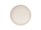 A plain, round, off-white ceramic plate is shown from above on a white background. Resembling the Sophie Pasta Bowl, 16 oz., its smooth surface and subtle rim offer a minimalist look—ideal for those who prefer simplicity over patterned melamine dinnerware.