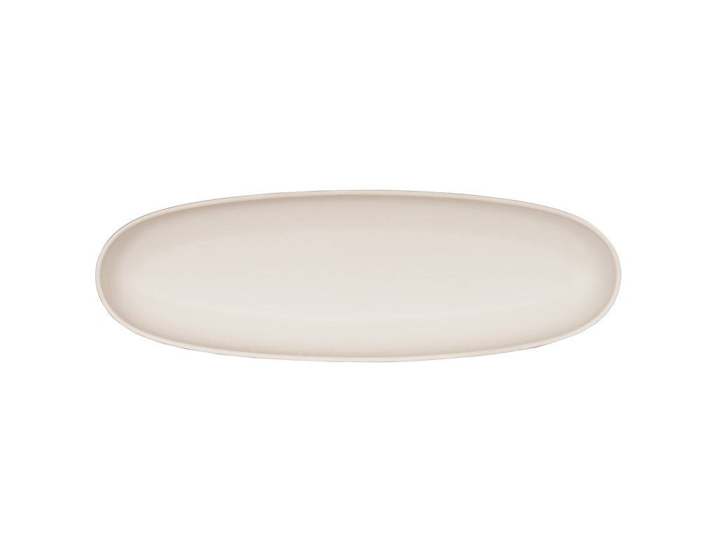 A plain, oval-shaped, beige Cal-Mil ceramic platter is shown from above against a white background. The platter has a smooth surface and gently curved, slightly raised edges.