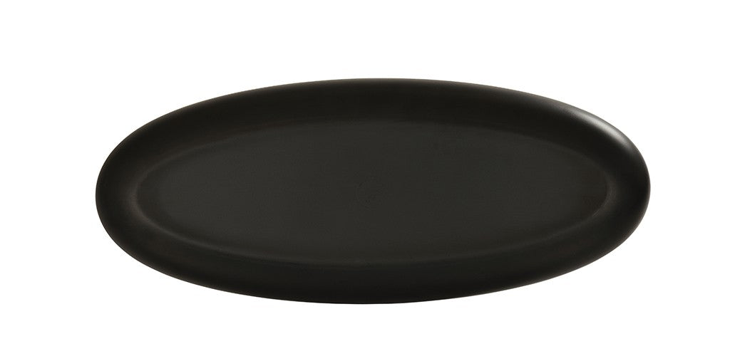 A plain, matte black oval plate, similar to the Sophie Pasta Bowl, is shown against a white background. The plate features a smooth, simple design with a slightly raised rim and no visible patterns or decorations.
