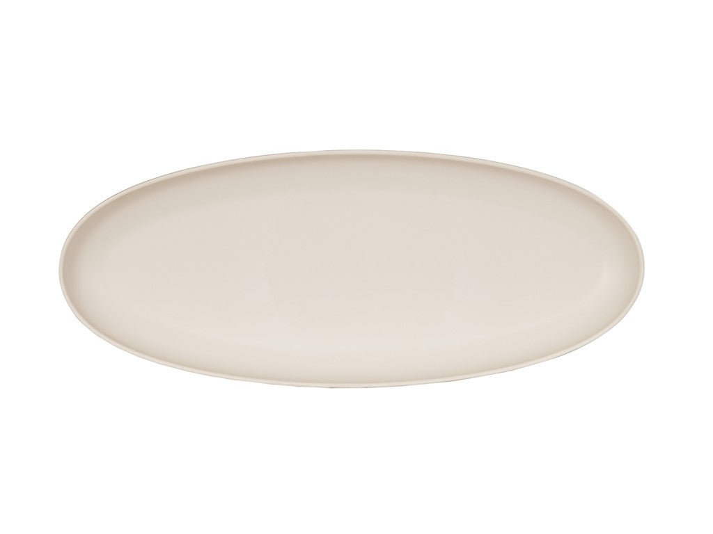 A plain, oval-shaped Cal-Mil plate with a smooth, glossy surface and a light cream color. Photographed from above on a white background, its simple and minimalistic design is reminiscent of the elegant Sophie Pasta Bowl.