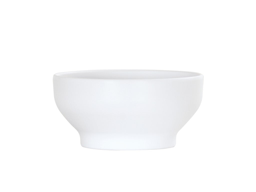 A plain, white Cal-Mil Nova Soup Bowl with smooth, clean lines and a slightly flared rim is centered on a white background. This 30 oz. ceramic bowl features a simple, modern design and a small, rounded base.