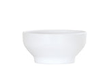 A plain, white Cal-Mil Nova Soup Bowl with smooth, clean lines and a slightly flared rim is centered on a white background. This 30 oz. ceramic bowl features a simple, modern design and a small, rounded base.