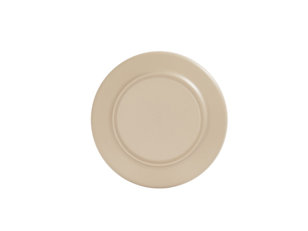 A plain, round, taupe Nova Bowl by Cal-Mil is shown from above against a white background. The bowl features a smooth, glossy surface with a slightly raised rim and a circular indentation in the center.
