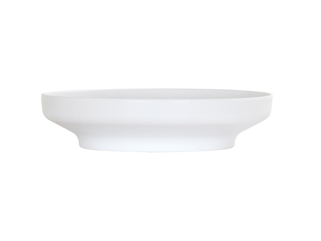 A plain, round Nova Bowl with smooth, clean lines and a wide, flat base. The sides gently curve upward, giving this coupe bowl a minimalist and modern appearance. The bowl is empty and set against a white background.
