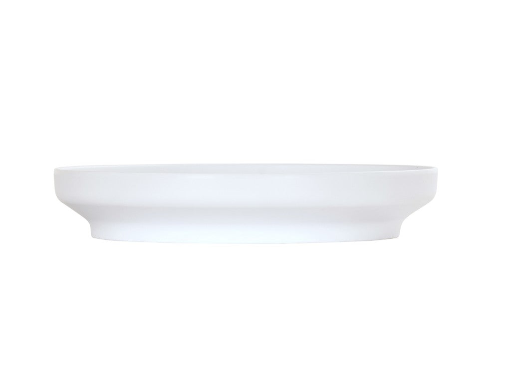 A white, round, shallow Cal-Mil Nova Bowl with a wide rim and slight base, photographed against a plain white background. This 14" white bowl appears minimalistic and smooth with no visible patterns or decorations.