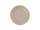 A beige ceramic Nova Bowl is shown from above against a white background. The 9 inch bowl is simple, round, and unadorned, with a raised circular base at the center, revealing the underside of the plate.