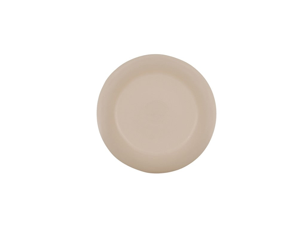 A plain, round, beige melamine plate is centered on a white background. The plate has smooth edges and no visible patterns or decorations. The simple design and neutral color give it a minimalist appearance.